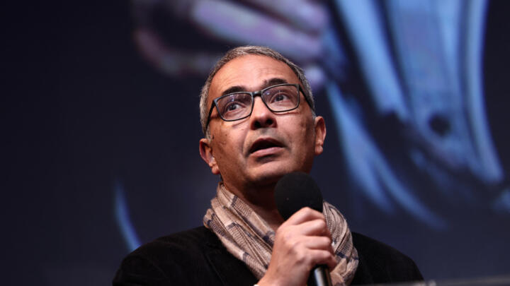 Algerian writer and journalist Kamel Daoud delivers a speech during an event in support of the French-Algerian writer Boualem Sansal at the Arab World Institute (Institut du Monde Arabe de Paris - IMA