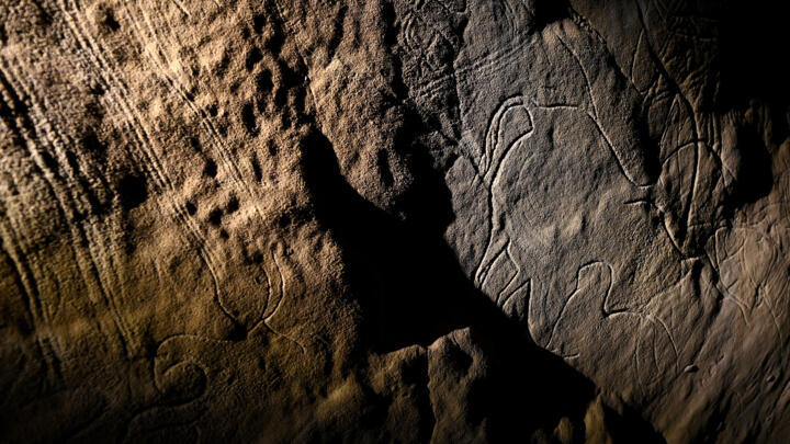 Photograph taken February 20, 2025 shows prehistoric engravings inside the Cussac cave in southwestern France.