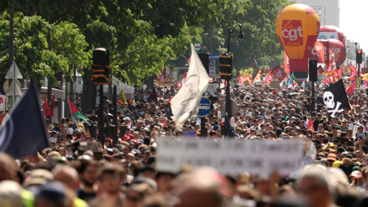 Demonstrators march during a May Day (Labour Day) rally, marking International Workers' Day, in Paris, on May 1, 2025. 