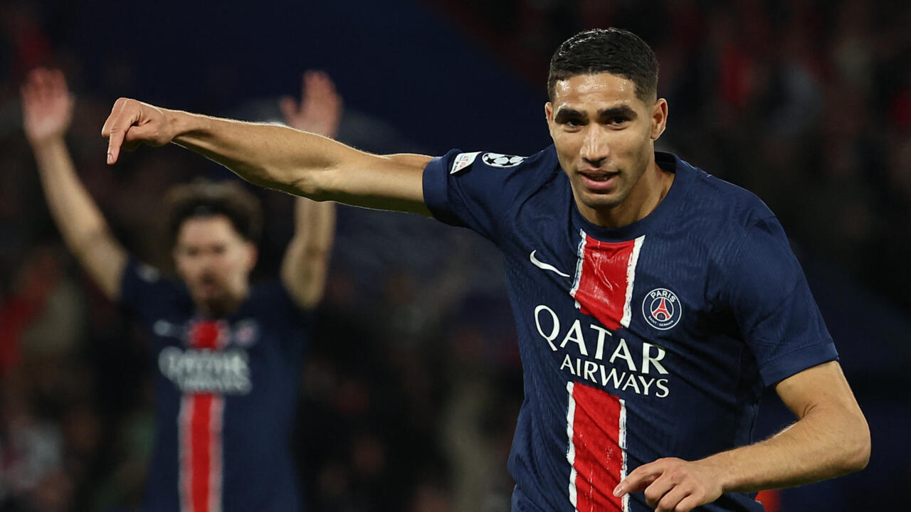 PSG's Achraf Hakimi celebrates after scoring against Arsenal at the Parc des Princes on May 7, 2025.