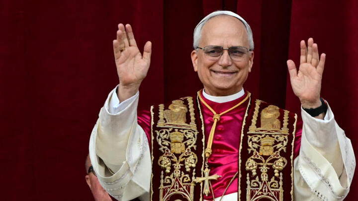 Pope Leo XIV addresses the faithful from the balcony of St. Peter's Basilica in the Vatican following his election as pontiff on May 8, 2025.