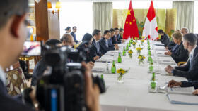 China's Vice Premier He Lifeng (third left) and Switzerland's President Karin Keller-Sutter (second right) attend preparatory talks ahead of the US and China trade meeting, in Geneva, on May 9, 2025.