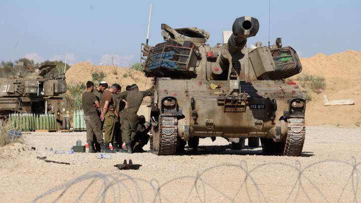 Israeli forces are seen near Israel's border with the Gaza Strip on May 5, 2025.