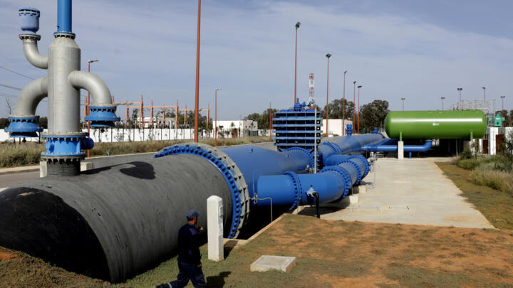 A security guard patrols a water supply station linking the Sebou and Bou Regreg basins near the city of Kénitra, Morocco, January 20, 2025.