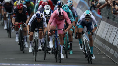Mads Pedersen, in pink, sprints towards victory in stage five of the Giro d'Italia