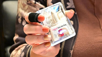 Amy Burgans, Douglas County clerk-treasurer, displays Narcan -- a brand name for naloxone -- from an emergency bag at her office in Minden, Nevada, on October 16, 2024