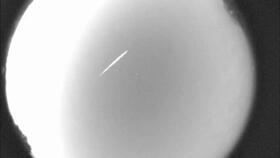 This photo provided by NASA shows an Eta Aquarid meteor streaking over northern Georgia on April 29, 2012.
