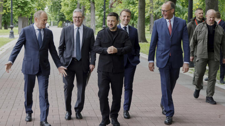 From left, Polish Prime Minister Donald Tusk, British Prime Minister Keir Starmer, Ukranian President Voloydmyr Zelensky, French President Emmanuel Macron and German Chancellor Friedrich Merz, walk si