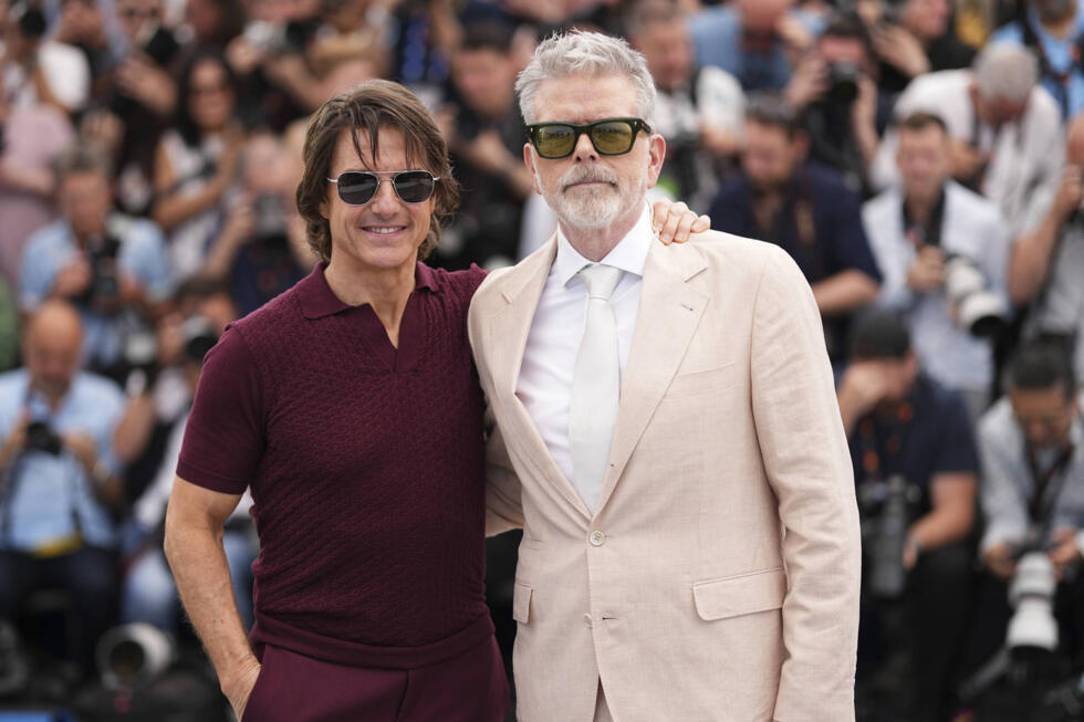 Cruise pictured with director Christopher McQuarrie at the "Mission: Impossible" photocall in Cannes.