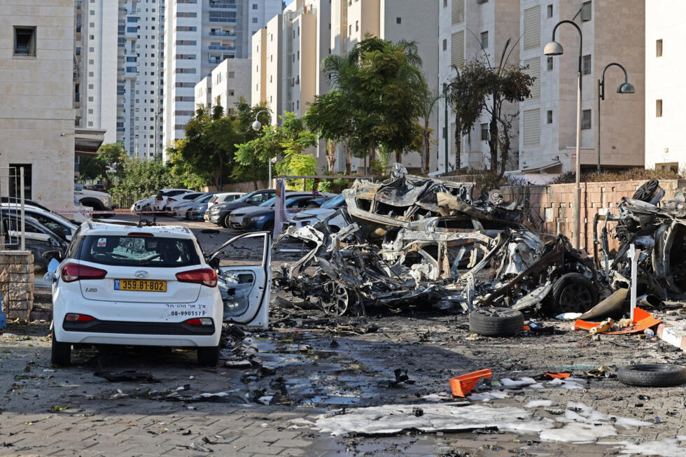 Burnt out vehicles in Ashkelon are pictured following a rocket attack from the Gaza Strip into Israel on October 7, 2023.