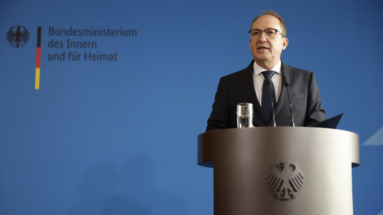 German Interior Minister Alexander Dobrindt addresses a press conference in Berlin