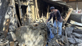 A Kashmiri villager examines damage to his house from overnight Indian shelling in Shah Kot, a district of Pakistan-administered Kashmir, Saturday, May 10, 2025.