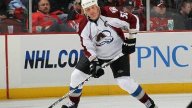 Adam Foote, who won two Stanley Cups with the NHL's Colorado Avalanche, was named head coach of the Vancouver Canucks