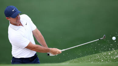 Second-ranked Rory McIlroy of Northern Ireland, the reigning Masters champion, makes a practice chip in preparing for the 107th PGA Championship at Quail Hollow, a course where he has won four times