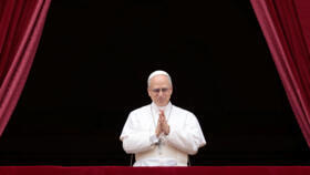 Pope Leo XIV leads a Regina Caeli prayer from the central balcony of Saint Peter's Basilica on May 11, 2025.