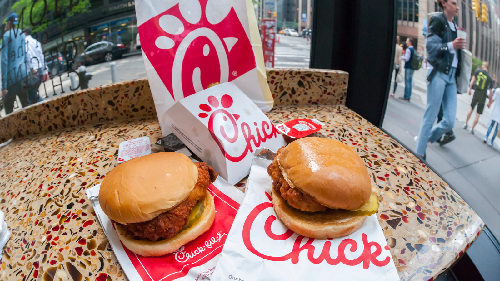 Chick-fil-A faces backlash for rolling back its antibiotic-free chicken policy.